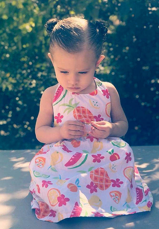 Giselle joined the competition — help win amazing prizes! baby, baby_toddler_clothing, birthday, child, daughter, dress, leisure, pattern, person, pink, play, sitting, summer, toddler, vacation