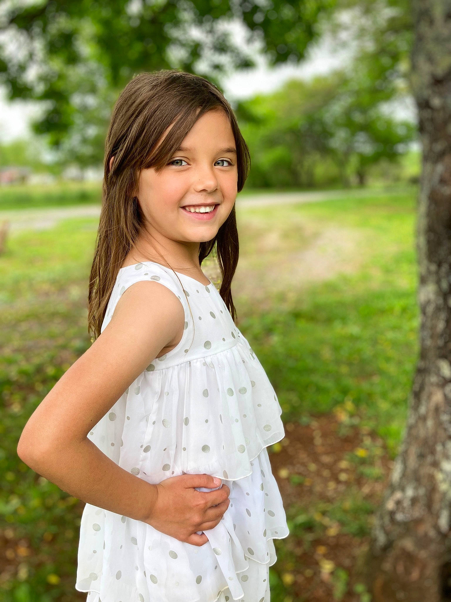 Charleigh Elizabeth is registered to the contest to win money with this photo: blond, brown_hair, day_dress, dress, flash_photography, formal_wear, fun, grass, hair, happy, joy, long_hair, pattern, people_in_nature, person, plant, skin, sleeve, smile, tree