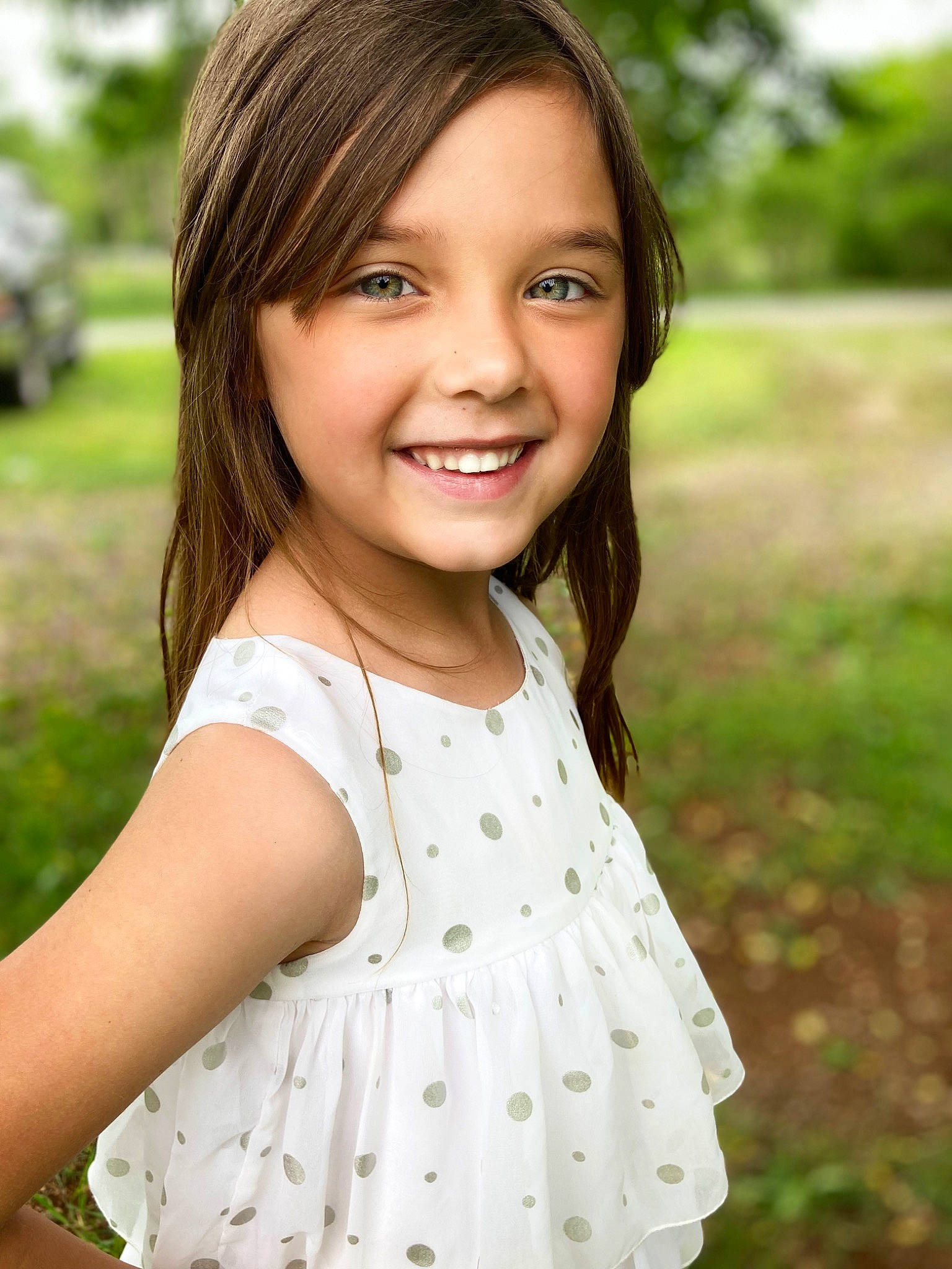 Charleigh Elizabeth is registered to the contest to win money with this photo: baby_toddler_clothing, day_dress, dress, eye, eyelash, face, flash_photography, grass, hair, hairstyle, happy, iris, joy, lip, one_piece_garment, people_in_nature, person, plant, shoulder, skin