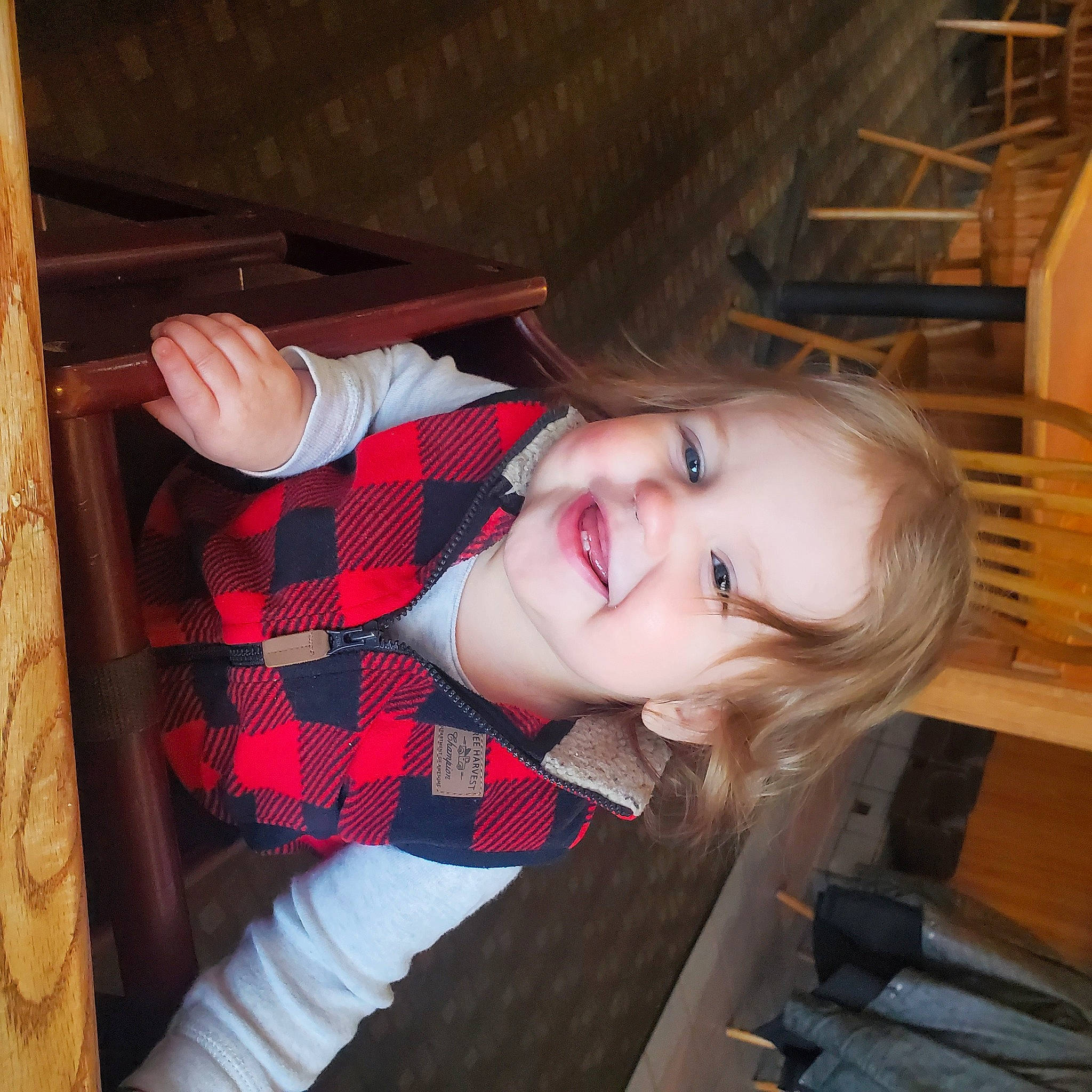Ryder joined the competition — help win amazing prizes! brown_hair, child, facial_expression, flash_photography, flooring, fun, happy, hardwood, iris, joy, lip, nose, pattern, person, plaid, sitting, skin, smile, tartan, toddler