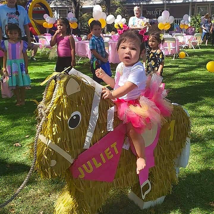 Juliet is registered to the contest to win money with this photo: child, costume, event, festival, fete, fun, person