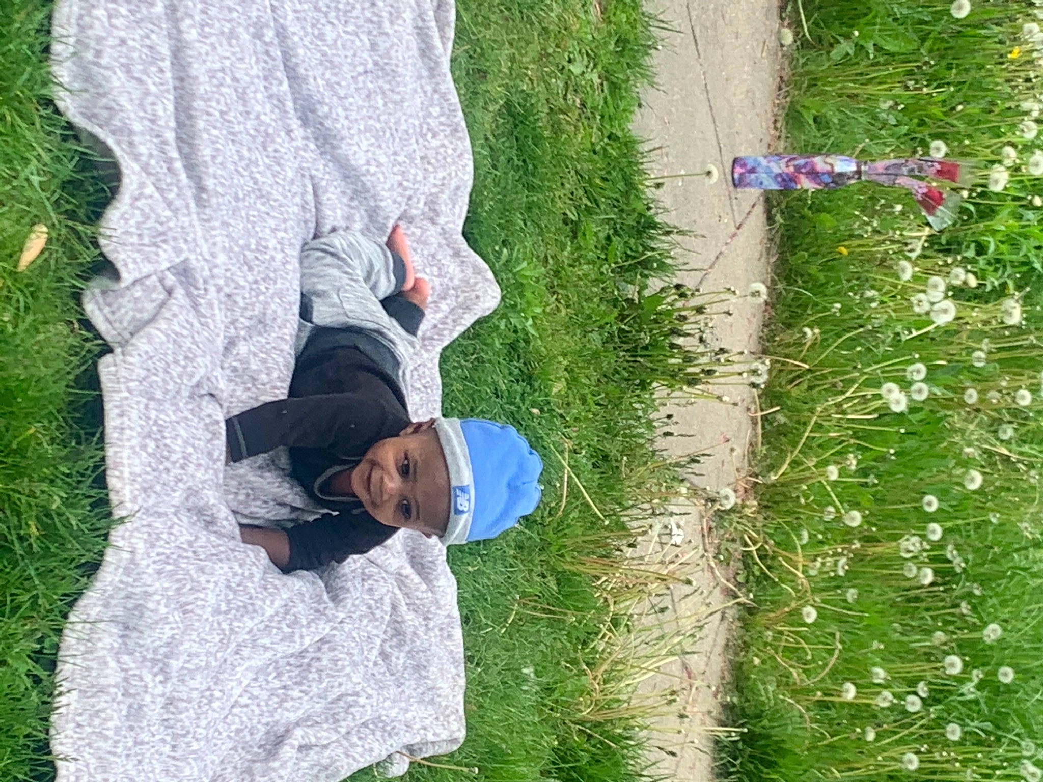 Kailand is registered to the contest to win money with this photo: botany, denim, electric_blue, flower, fun, grass, grass_family, green, groundcover, hat, headwear, lawn, leaf, leisure, nature, organism, people_in_nature, person, plant, shrub