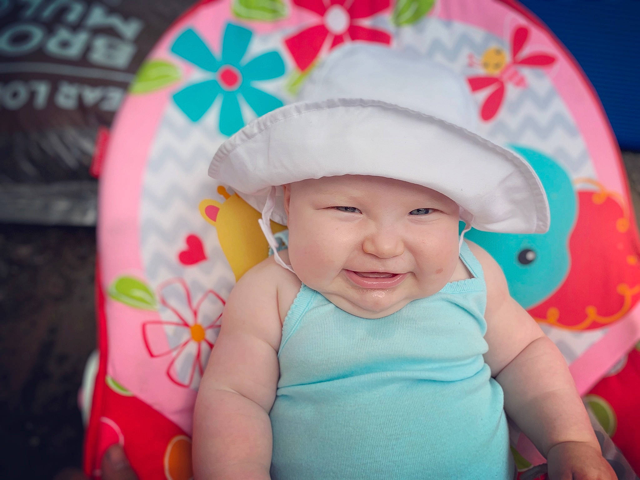 Kaiah is registered to the contest to win money with this photo: baby, bonnet, cap, child, cool, fashion_accessory, fun, happy, hat, head, headgear, headwear, joy, person, pink, play, product, skin, smile, sun_hat