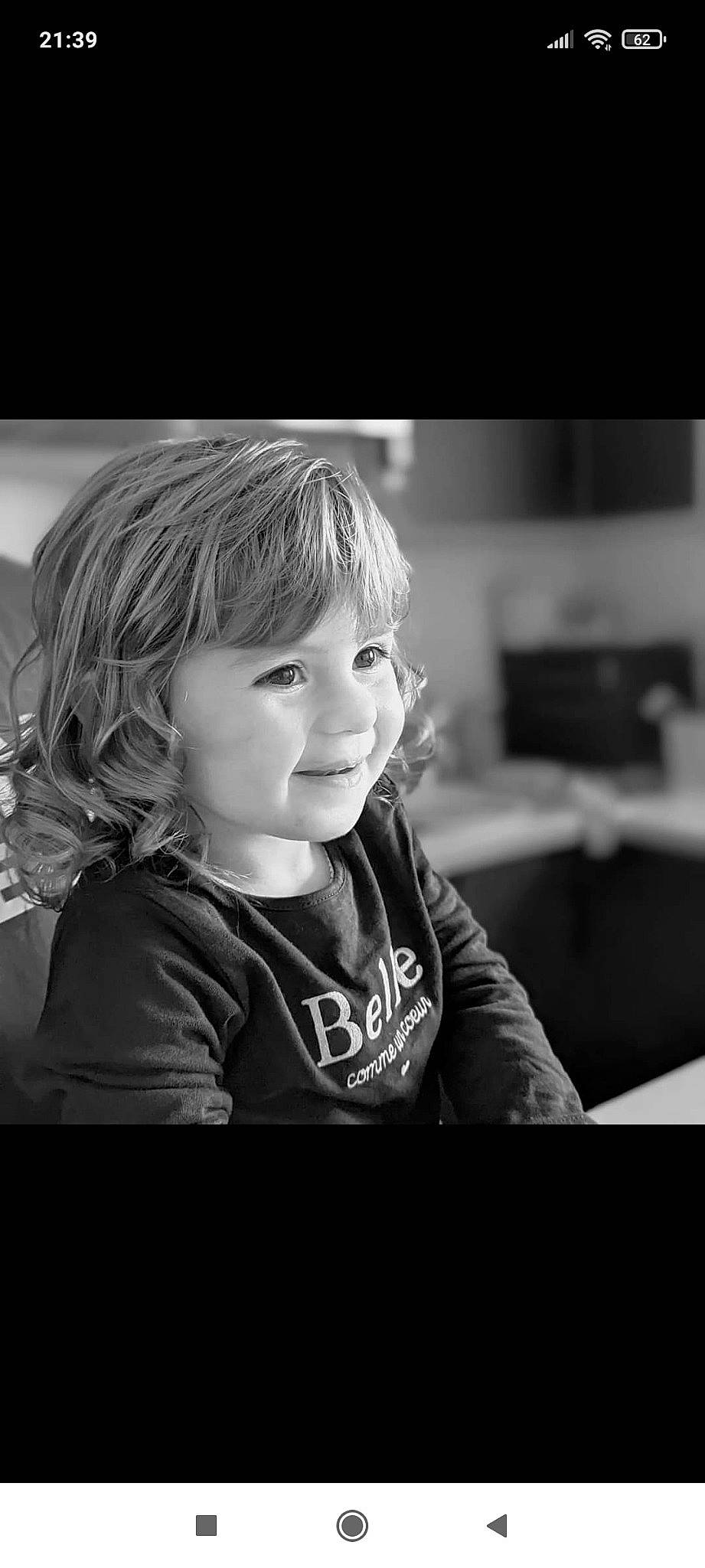 Rose participe au concours pour gagner de l'argent avec cette photo : baby_toddler_clothing, beauty, black_and_white, blond, cheek, child, eye, face, flash_photography, fun, happy, iris, joy, monochrome, monochrome_photography, outerwear, person, sleeve, smile, style