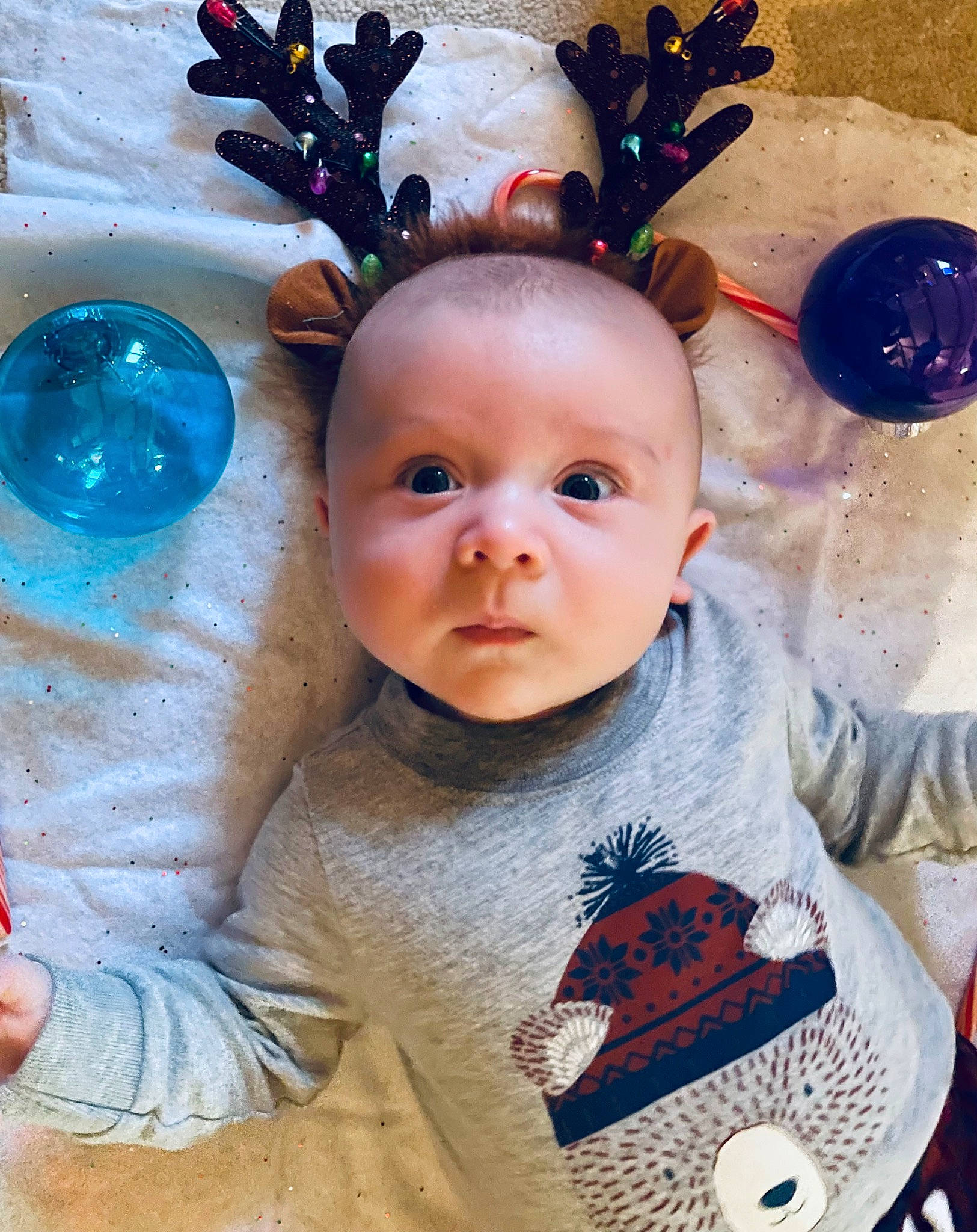 Denni is registered to the contest to win money with this photo: baby, baby_toddler_clothing, blue, cheek, child, eye, finger, fun, happy, head, headgear, iris, nose, person, pink, product, skin, sleeve, textile, toddler