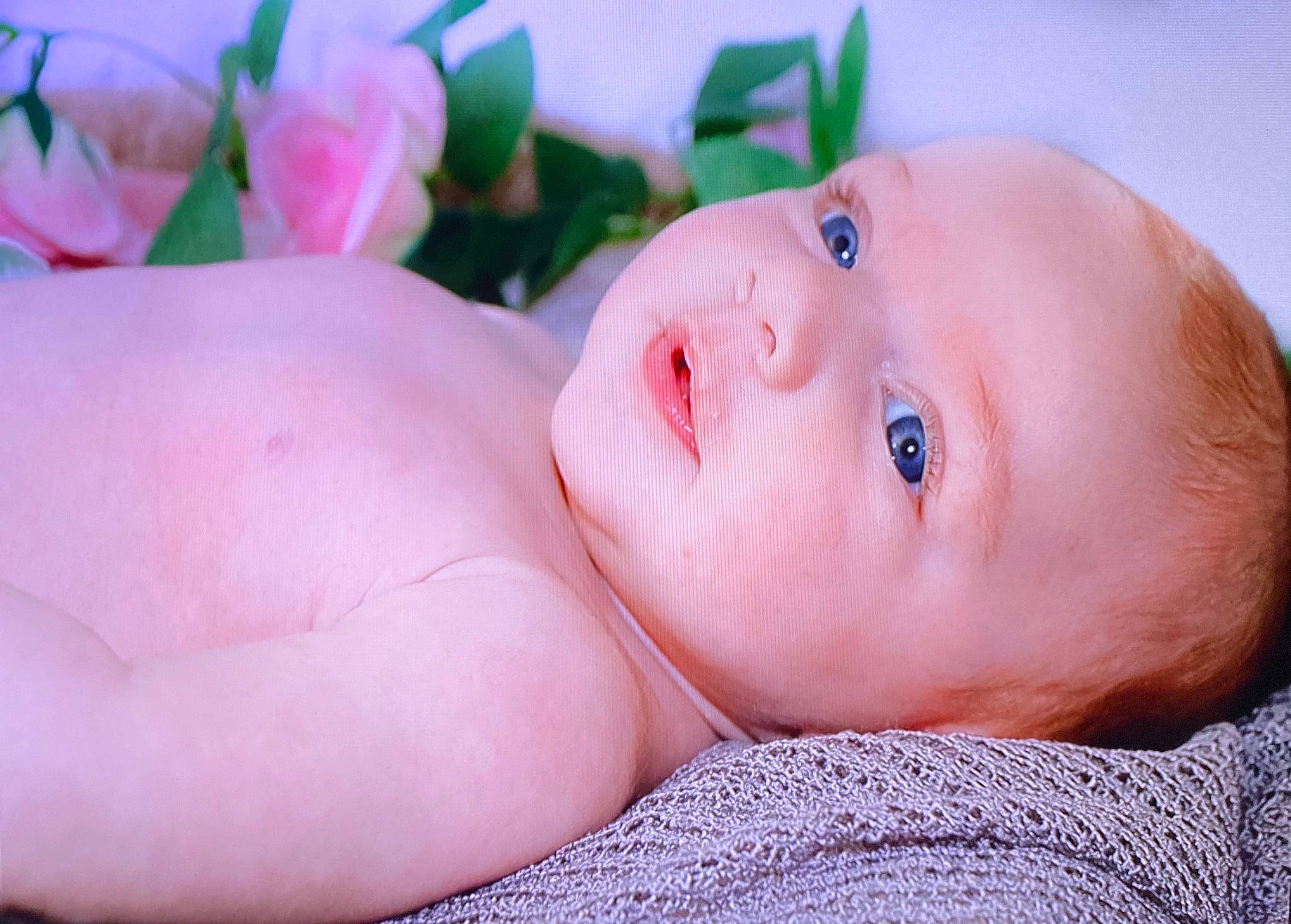 Kyra is registered to the contest to win money with this photo: baby, beauty, cheek, chest, child, close_up, eye, eyebrow, face, happy, iris, lip, nail, navel, neck, person, petal, pink, plant, skin