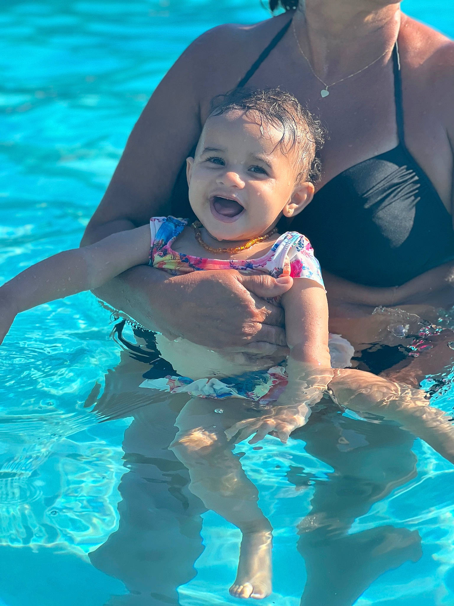 Angelina joined the competition — help win amazing prizes! aqua, azure, blue, face, flash_photography, fun, happy, head, leisure, light, muscle, people_on_beach, person, personal_protective_equipment, photograph, recreation, smile, summer, swimming_pool, toddler