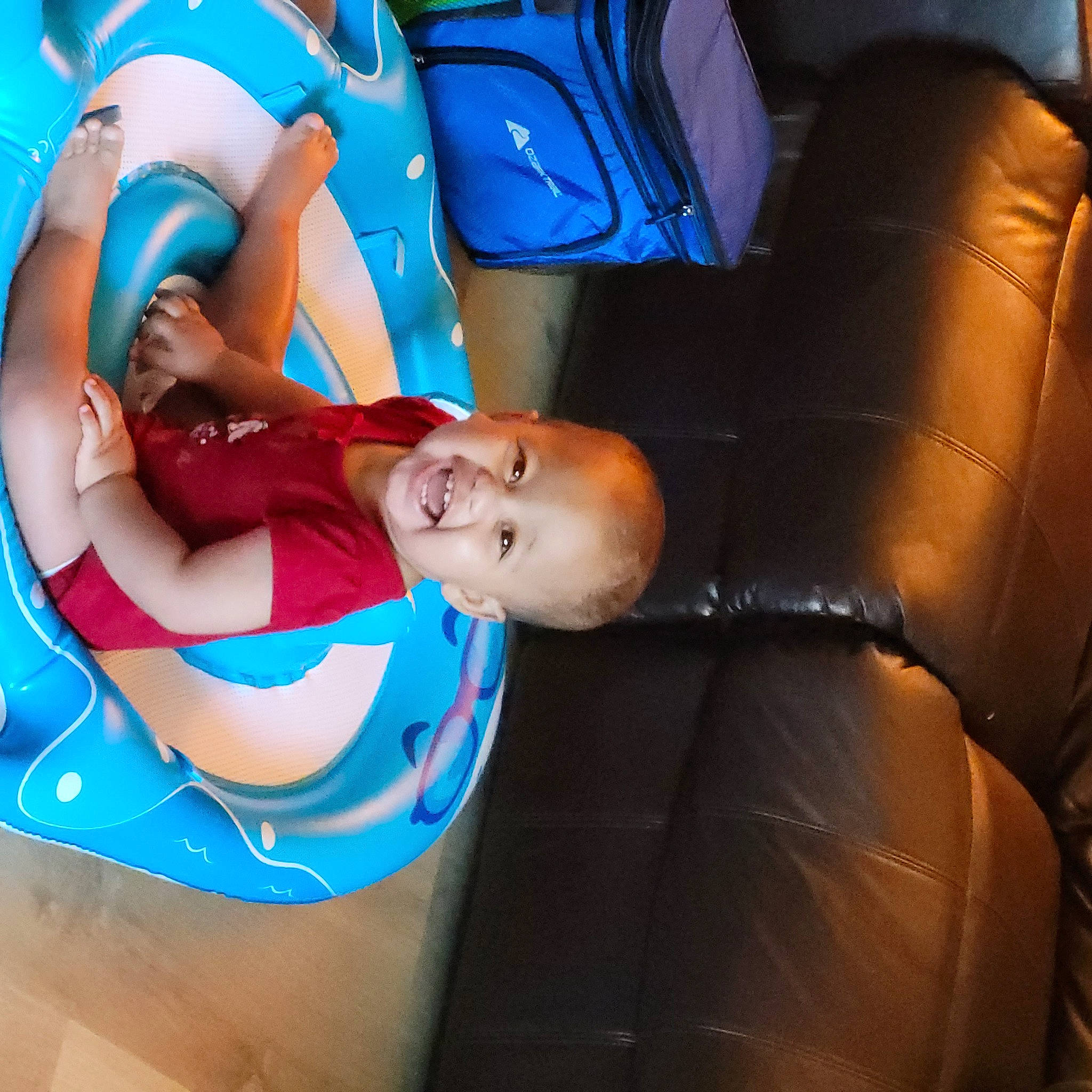 Rori joined the competition — help win amazing prizes! abdomen, arm, baby, blue, chest, child, comfort, electric_blue, event, fun, happy, human_leg, joy, knee, lap, leisure, person, shorts, swimwear, thigh