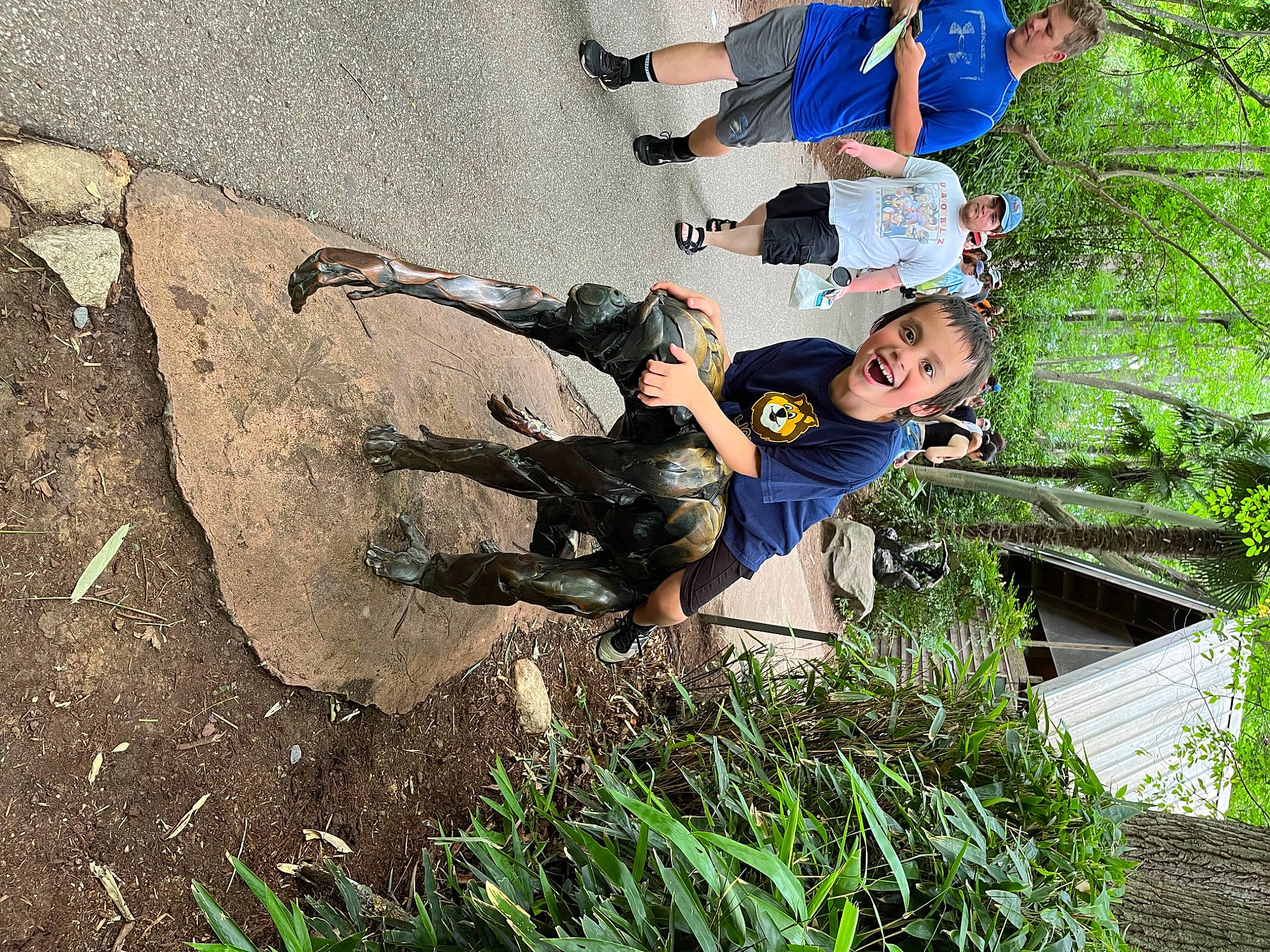 Dante is registered to the contest to win money with this photo: adventure, fun, grass, happy, headwear, jeans, joy, landscape, leisure, people_in_nature, person, plant, recreation, shadow, soil, t_shirt