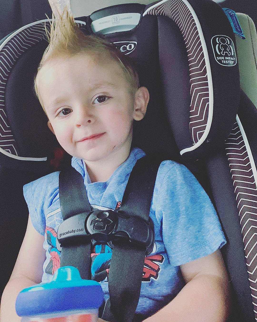 Casyn is registered to the contest to win money with this photo: auto_part, automotive_design, automotive_tire, baby, baby_carriage, baby_toddler_clothing, car_seat, car_seat_cover, child, cool, electric_blue, joy, motor_vehicle, person, personal_protective_equipment, seat_belt, skin, smile, steering_part, steering_wheel