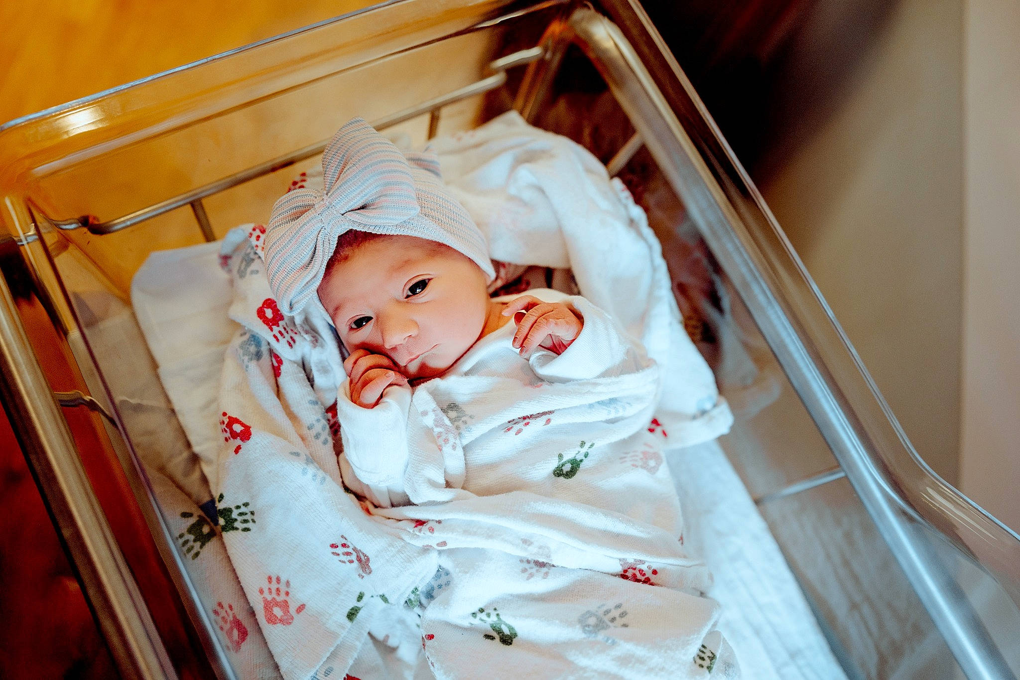 Ember is registered to the contest to win money with this photo: baby, baby_products, baby_safety, baby_toddler_clothing, bed, bedding, bedtime, child, comfort, event, headwear, hospital, human_body, infant_bed, linens, medical_equipment, peach, person, product, room