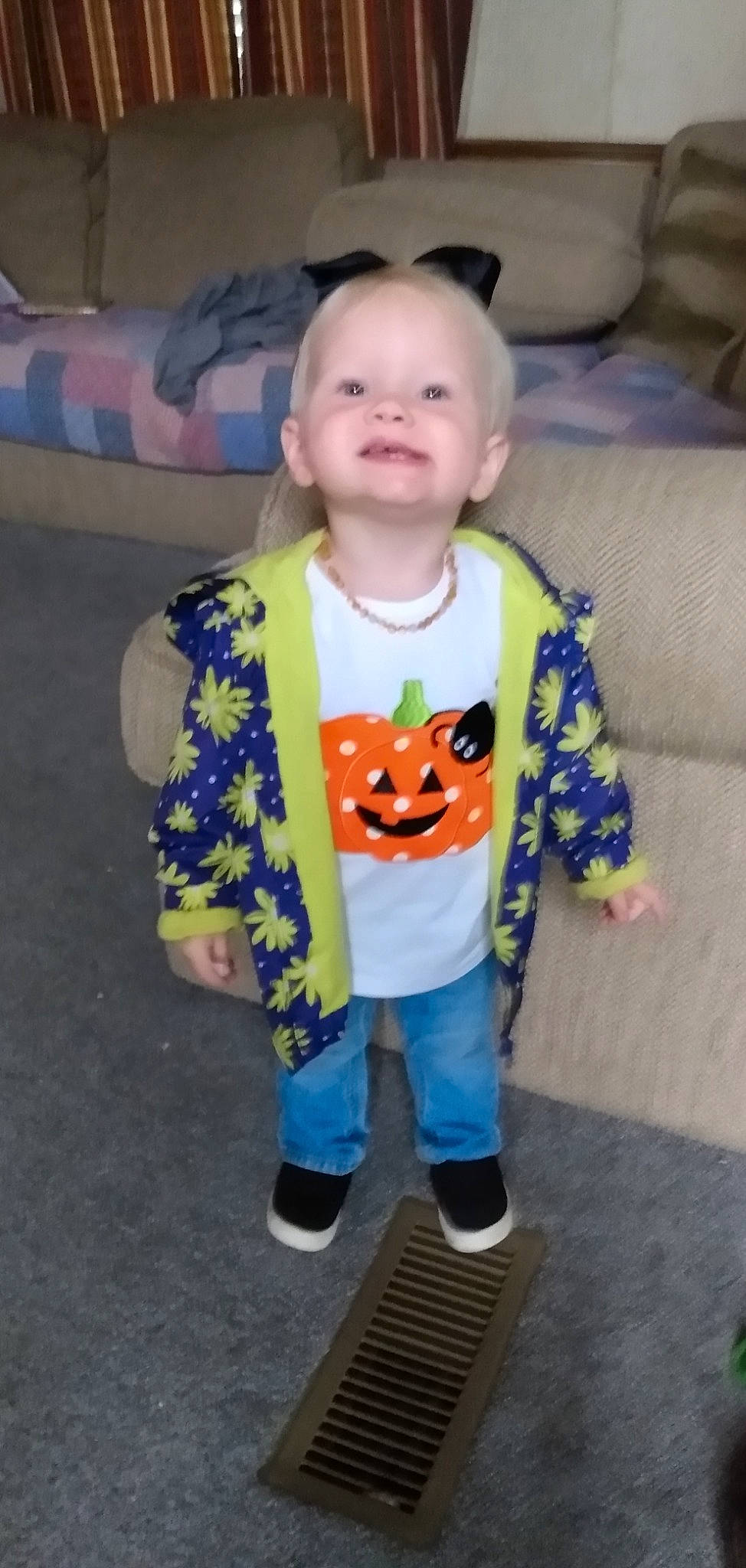 Dixie joined the competition — help win amazing prizes! baby, baby_toddler_clothing, cheek, child, costume, couch, eye, face, flooring, fun, happy, head, joy, nose, outerwear, pattern, person, room, sleeve, smile