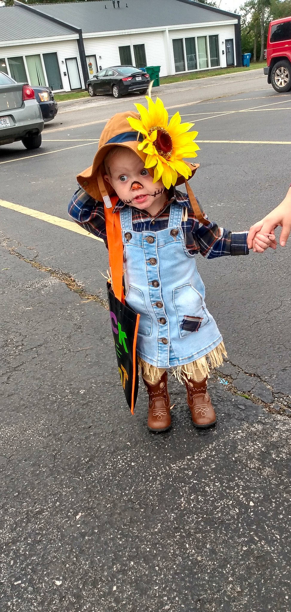 Dixie joined the competition — help win amazing prizes! asphalt, electric_blue, event, face, flower, fun, happy, hat, headgear, helmet, human_leg, people, person, plant, road, street, street_fashion, tire, toddler, wheel