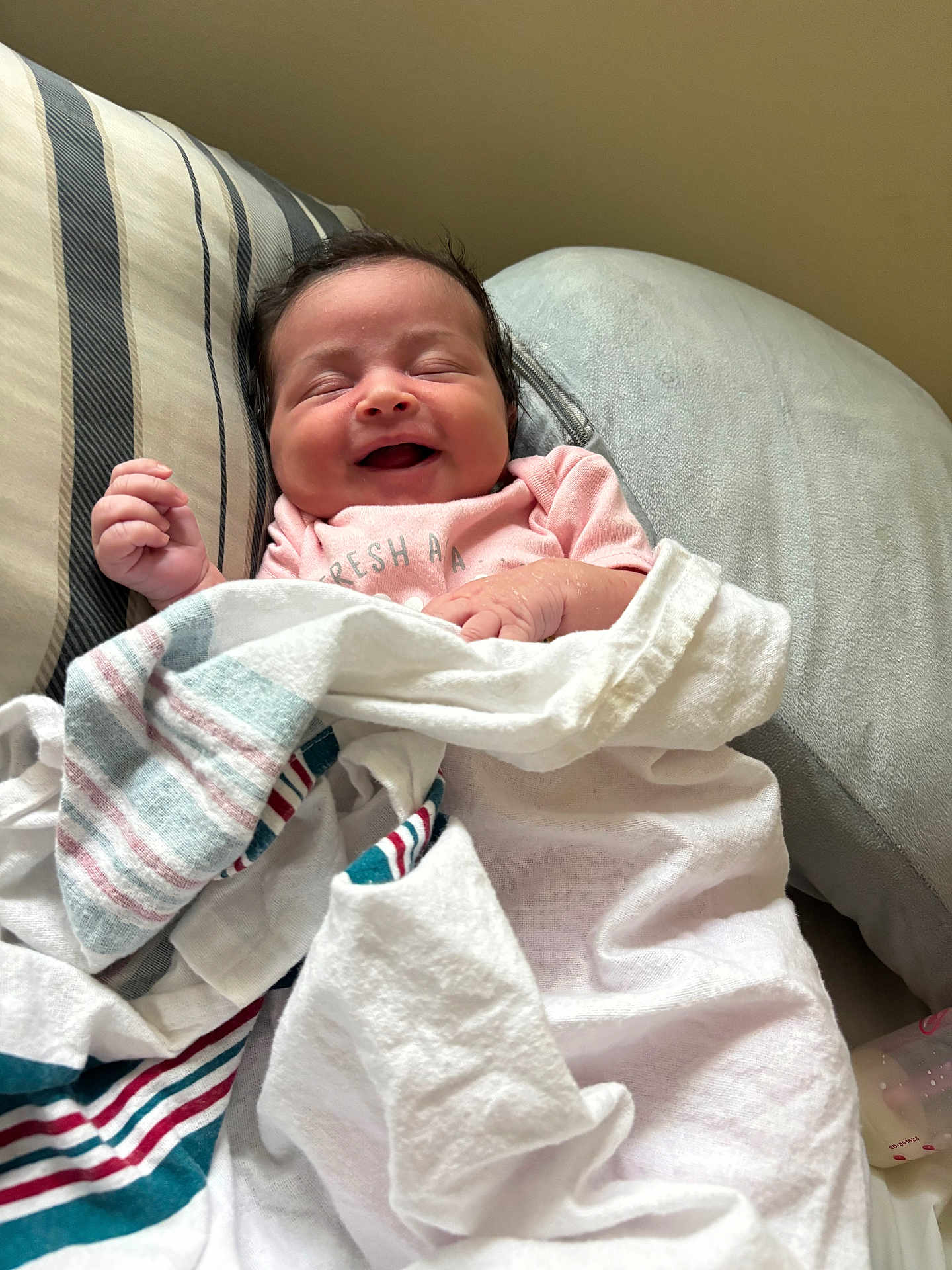 Joshlynn joined the competition — help win amazing prizes! baby, newborn, smiling, blanket, pillow, cushion, infant, sleeping, face, clothing, bed, resting, happy, indoors, person, bottle, soft, comfort, cute, relaxed
