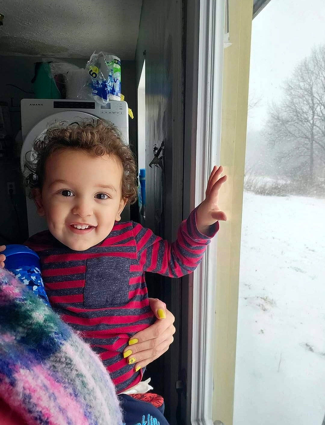 Zyere is registered to the contest to win money with this photo: baby, baby_toddler_clothing, child, couch, electric_blue, finger, fun, happy, joy, leisure, magenta, person, room, sitting, smile, snow, t_shirt, toddler, tree, vacation