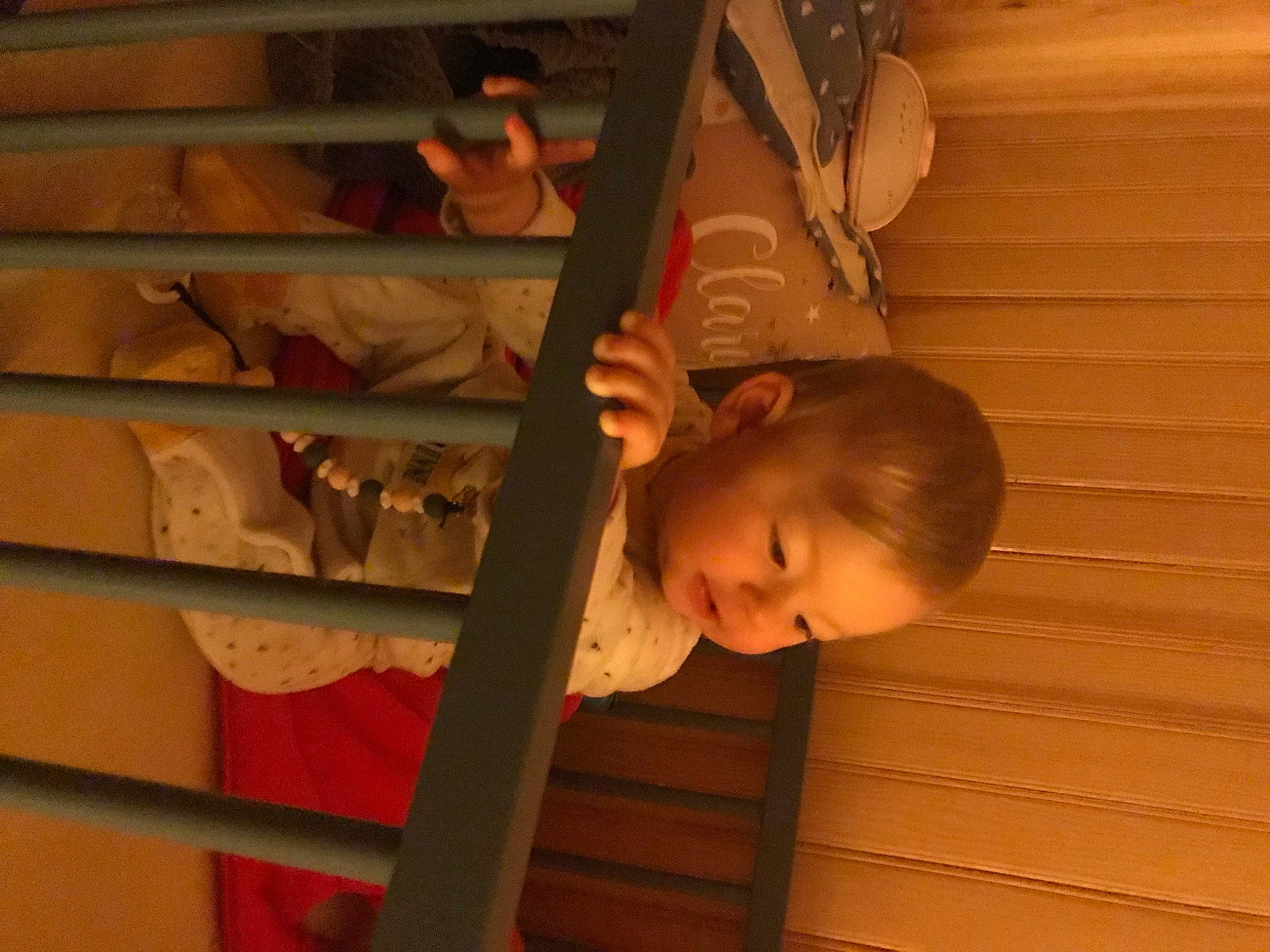 Clary participe au concours pour gagner de l'argent avec cette photo : baby, baby_products, baby_toddler_clothing, beam, ceiling, child, chin, flooring, fun, hardwood, pattern, person, room, stairs, toddler, varnish, wood, wood_flooring, wood_stain