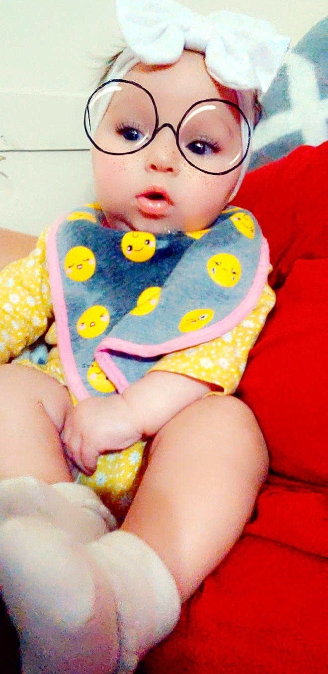 Mattie is registered to the contest to win money with this photo: baby, child, eyewear, glasses, headwear, person, toddler