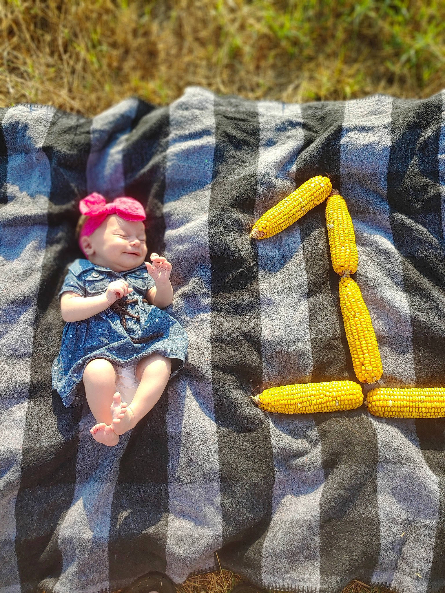 Mattie joined the competition — help win amazing prizes! baby_products, child, design, linens, pattern, person, plaid, play, product, quilt, tartan, textile, toddler