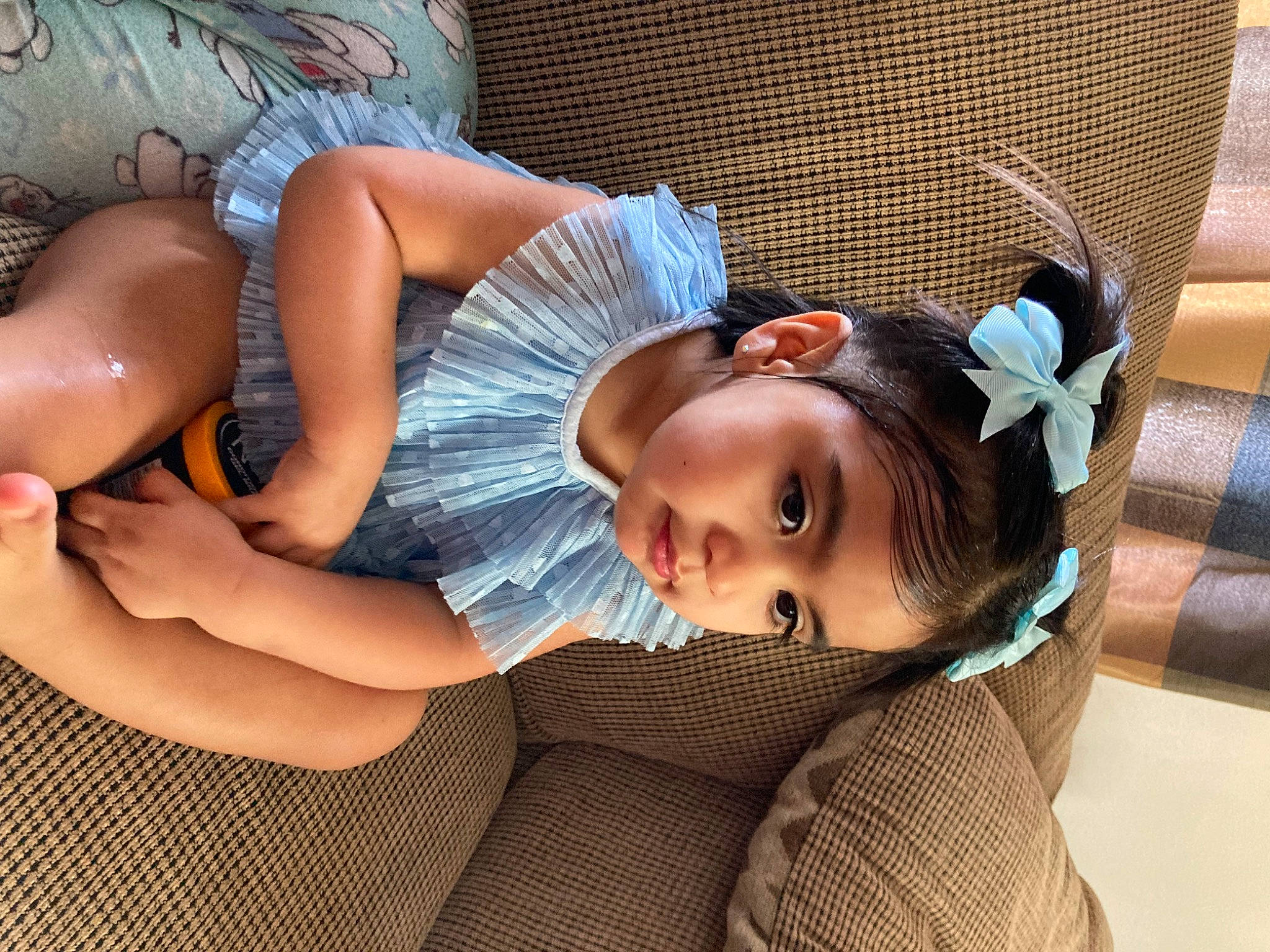 Luna is registered to the contest to win money with this photo: arm, black_hair, comfort, cool, dress, eyewear, facial_expression, finger, hairstyle, hand, happy, head, headgear, joint, leg, linens, mouth, person, shoulder, skin