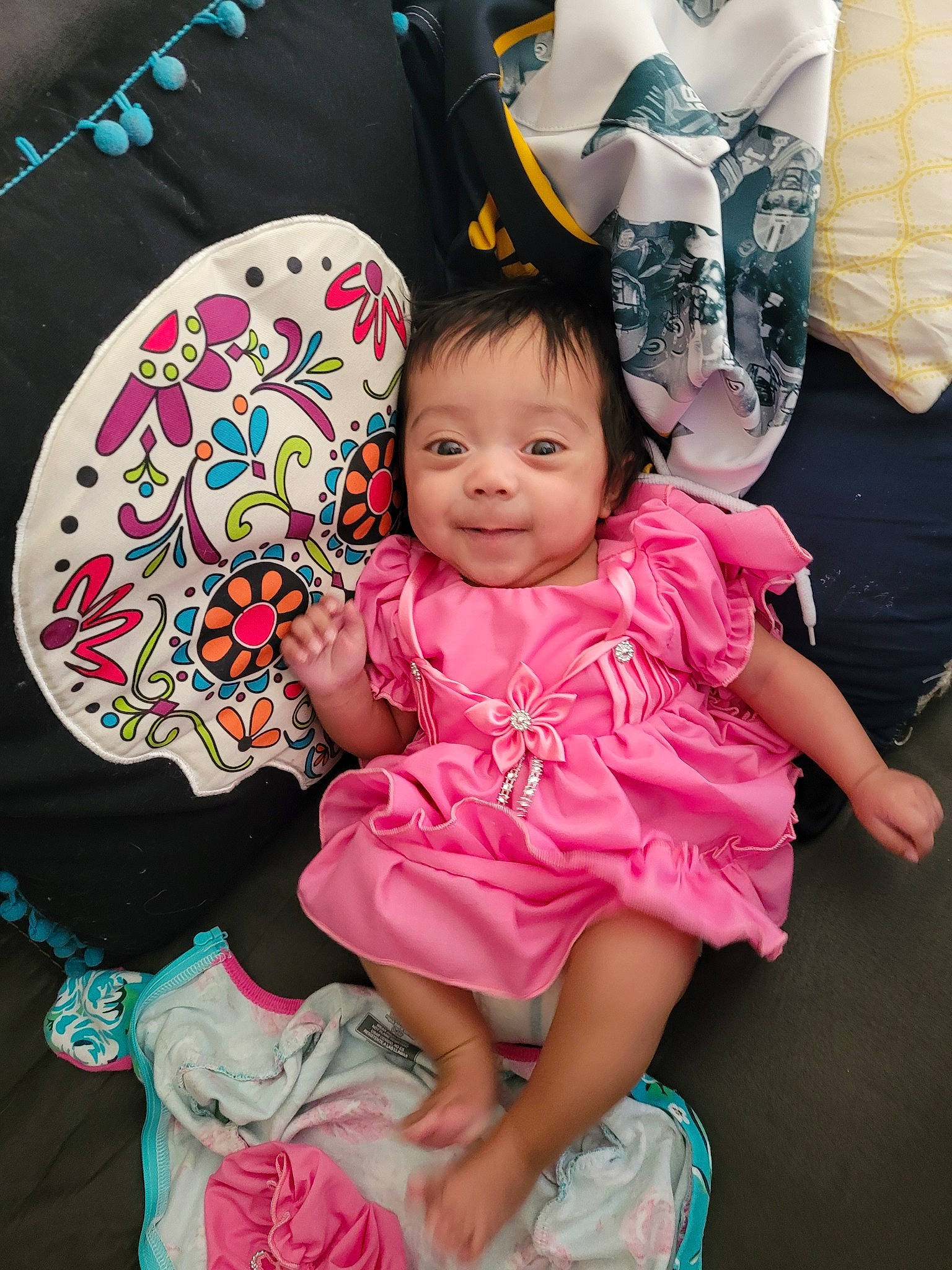 Khaleesi joined the competition — help win amazing prizes! baby_toddler_clothing, child, event, eye, facial_expression, fun, hairstyle, happy, headgear, magenta, pattern, person, pink, play, sitting, skin, sleeve, smile, toddler, wheel