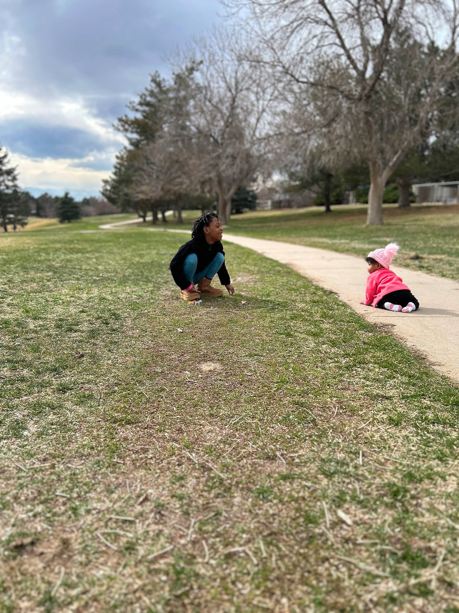 Trinity joined the competition — help win amazing prizes! asphalt, cloud, grass, grass_family, grassland, happy, joy, landscape, lawn, leisure, meadow, pasture, people_in_nature, person, plant, recreation, sitting, sky, soil, tire