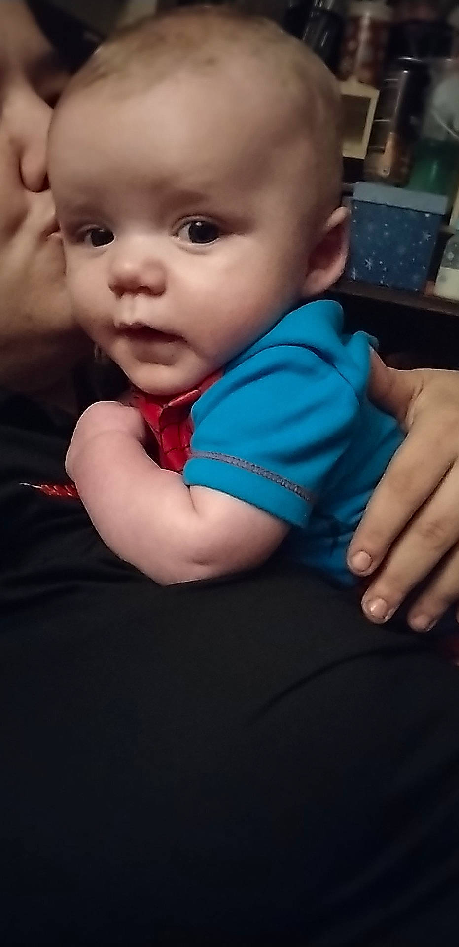 Lincoln is registered to the contest to win money with this photo: baby, baby_toddler_clothing, cheek, child, chin, comfort, elbow, electric_blue, finger, flash_photography, fun, gesture, happy, iris, nose, person, sitting, skin, sleeve, t_shirt