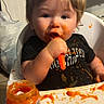 toddler, baby, high_chair, messy, food, baby_food, spoon, orange_food, blue_eyes, child, indoor, cute, smudged_face, feeding, funny, infant, plastic_jar, candid, eating, portrait
