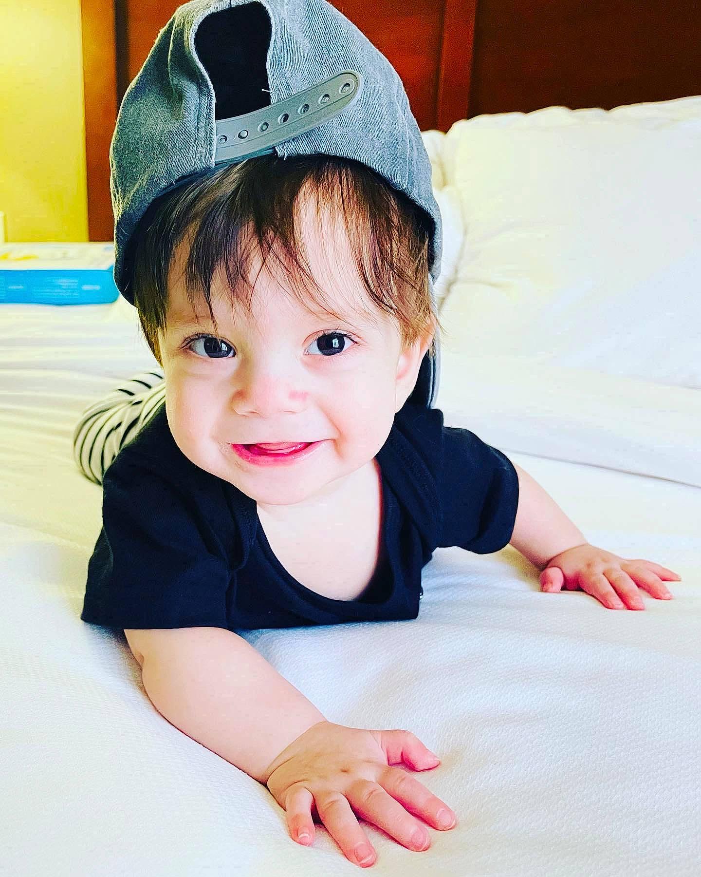Hayes joined the competition — help win amazing prizes! baby, baby_toddler_clothing, baseball_cap, cap, child, collar, comfort, costume_hat, fashion_accessory, flash_photography, fun, happy, hat, headgear, headpiece, joy, person, pillow, sleeve, smile