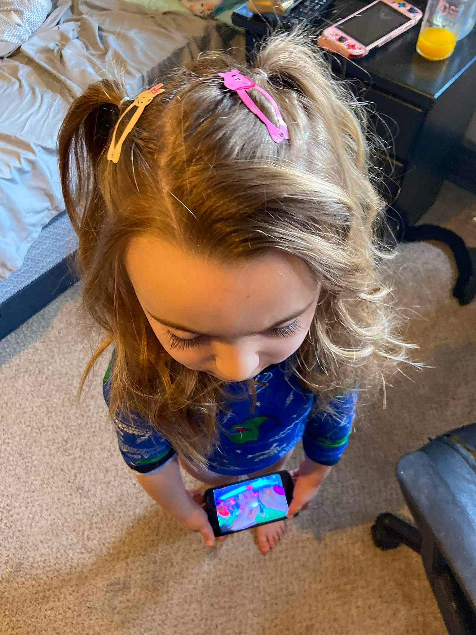 Sarah is registered to the contest to win money with this photo: chair, child, electric_blue, eyewear, fashion_accessory, flooring, fun, hair_coloring, headband, iris, mouth, nail, person, play, sitting, toddler, vacation