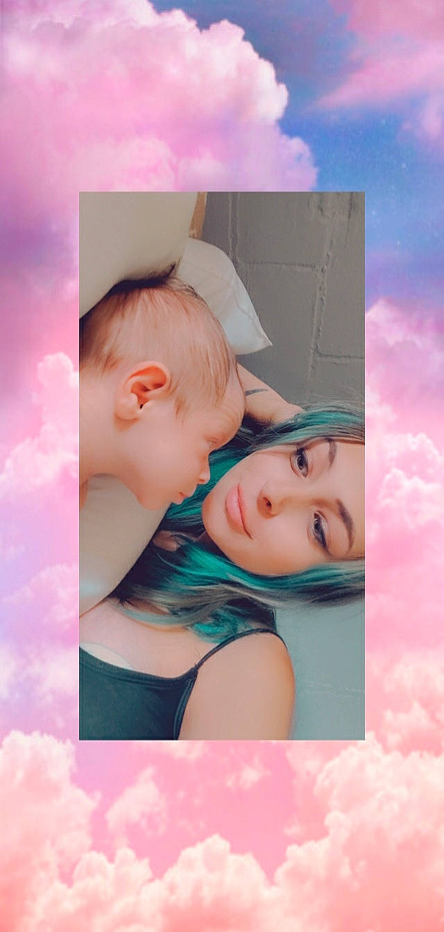 Ricky is registered to the contest to win money with this photo: aqua, art, azure, baby, baby_toddler_clothing, child, eyelash, flash_photography, gesture, happy, love, magenta, pattern, person, picture_frame, pink, purple, room, skin, stock_photography