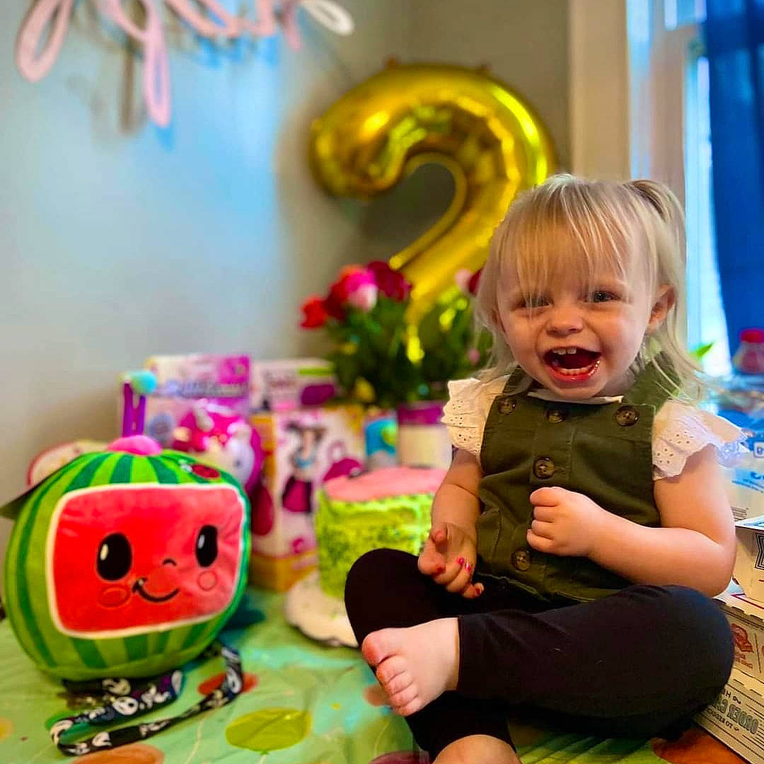 Charlotte joined the competition — help win amazing prizes! baby, baby_toddler_clothing, blue, child, event, facial_expression, fun, green, happy, head, holiday, people, person, photograph, pink, purple, smile, snapshot, toddler, toy