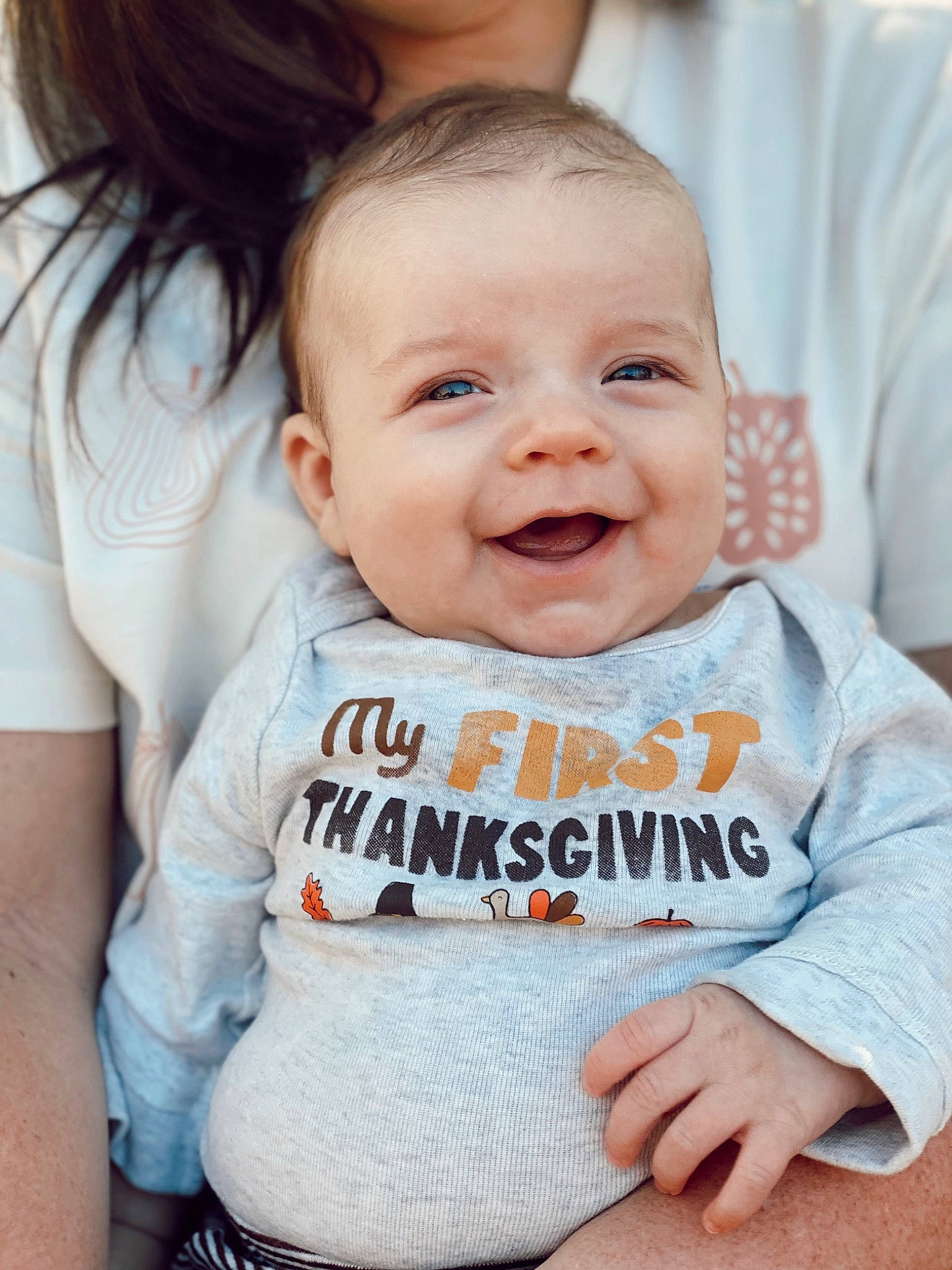 Bowen is registered to the contest to win money with this photo: arm, baby, baby_toddler_clothing, cheek, chin, dress, eye, face, finger, gesture, hairstyle, happy, head, human_body, iris, joy, organ, person, skin, sleeve