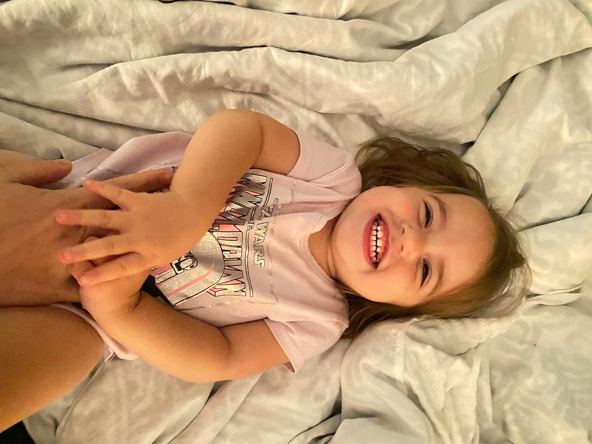 Caleigh joined the competition — help win amazing prizes! blond, child, comfort, elbow, facial_expression, flash_photography, gesture, happy, human_leg, joint, joy, linens, lip, mammal, mouth, muscle, person, shoulder, skin, smile