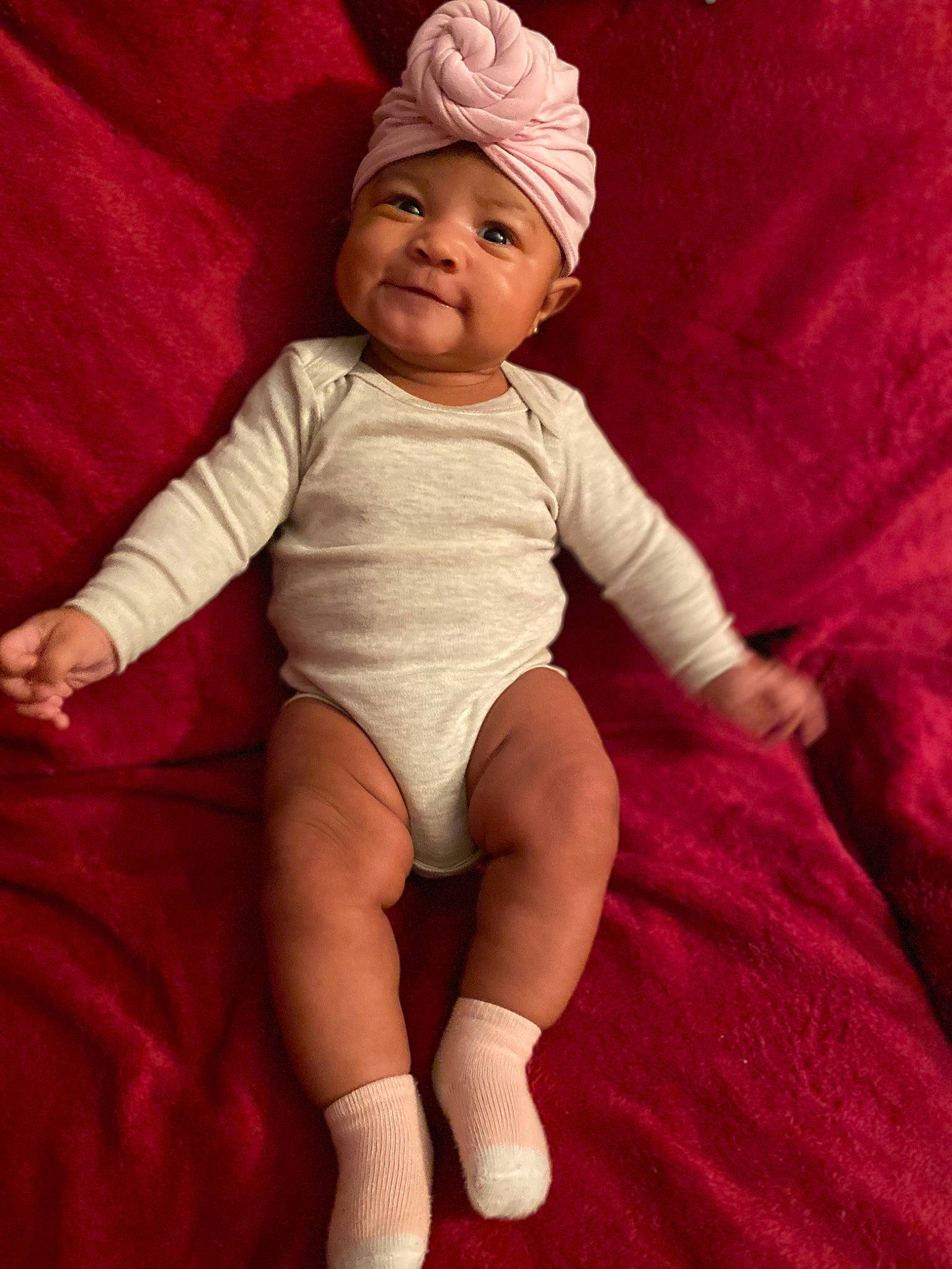 Ty Làni is registered to the contest to win money with this photo: baby, baby_toddler_clothing, beauty, cap, cheek, costume_hat, eye, face, finger, happy, headwear, human_body, leg, lip, person, pink, skin, sleeve, smile, t_shirt