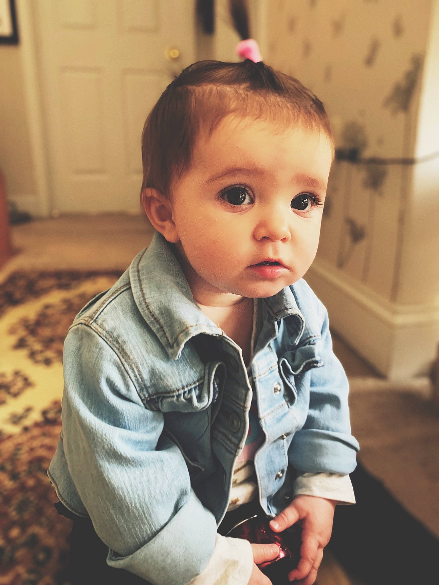 Indie joined the competition — help win amazing prizes! baby, baby_toddler_clothing, cabinetry, cheek, child, child_model, curious, door, ear, eyelash, forehead, hair_accessory, person, toddler, wood_stain