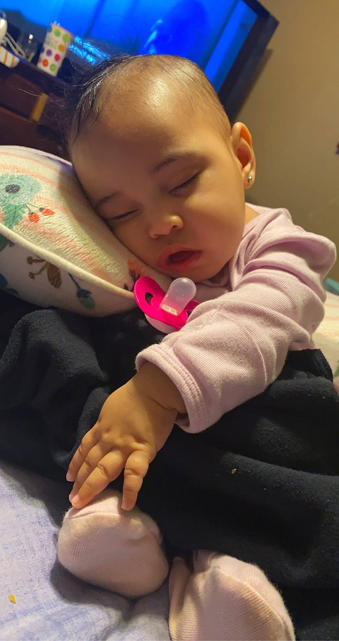 Alaiyah is registered to the contest to win money with this photo: baby, baby_toddler_clothing, cheek, child, comfort, drinkware, ear, facial_expression, finger, fun, gesture, head, human_body, lap, mouth, nail, nose, person, skin, sleeve