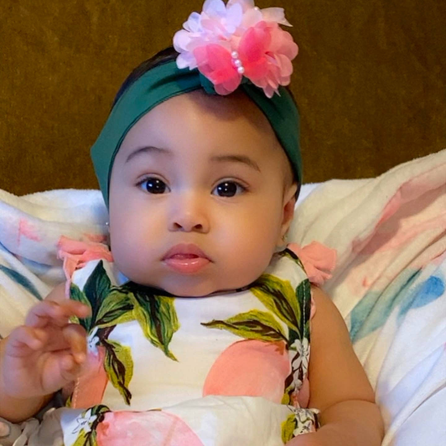 Alaiyah joined the competition — help win amazing prizes! baby_toddler_clothing, cheek, chin, dress, ear, eye, eyelash, face, happy, head, headgear, iris, lip, nose, person, petal, pink, skin, surprise, textile