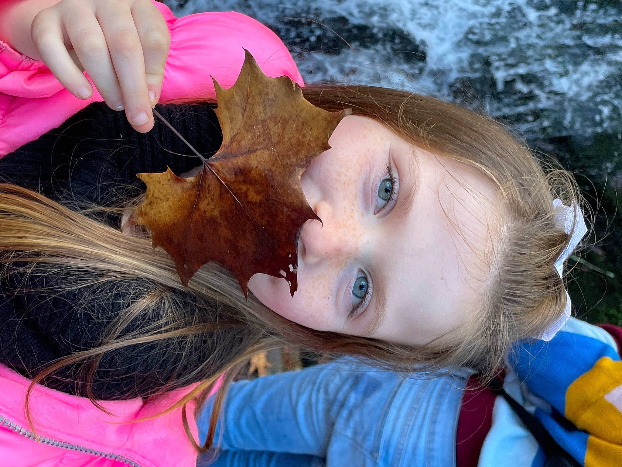 Cheyenne is registered to the contest to win money with this photo: cheek, child, chin, eyebrow, eyelash, facial_expression, fun, grass, hair, hairstyle, happy, head, iris, lip, long_hair, mouth, people_in_nature, person, skin, toddler