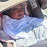 Melanii joined the competition — help win amazing prizes! baby, infant, car_seat, blanket, clothing, child, person, seat_belt, indoor, cute, portrait, smiling, expression, young_child, soft_fabric, cozy, casual_wear, head, face, newborn