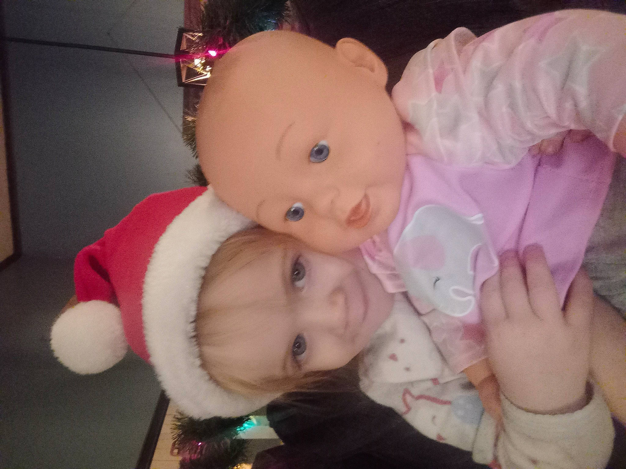 Georgia is registered to the contest to win money with this photo: baby, baby_toddler_clothing, cheek, child, doll, ear, event, eye, face, facial_expression, fur, happy, head, holiday, nose, person, pink, skin, stuffed_toy, toddler