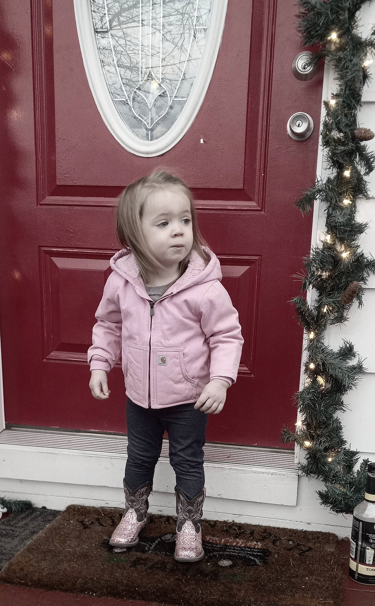 Georgia is registered to the contest to win money with this photo: child, christmas_decoration, christmas_eve, christmas_ornament, christmas_tree, conifer, event, facial_expression, fun, happy, holiday, holiday_ornament, monochrome, monochrome_photography, ornament, person, room, toddler, white, winter