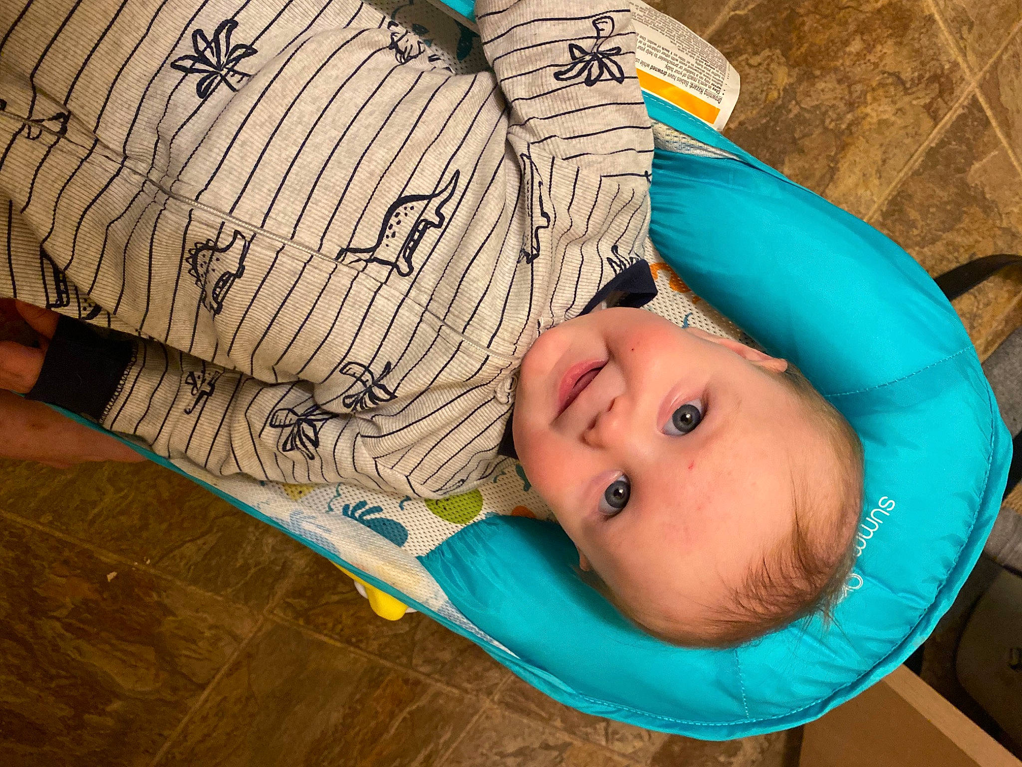 Corbyn joined the competition — help win amazing prizes! baby, baby_products, baby_toddler_clothing, chair, cheek, child, comfort, electric_blue, eye, finger, flooring, hairstyle, happy, hardwood, head, headgear, person, skin, t_shirt, toddler