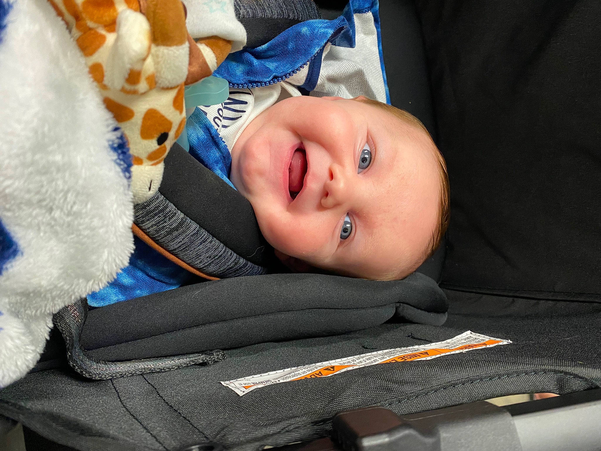 Corbyn joined the competition — help win amazing prizes! baby, baby_carriage, baby_products, baby_safety, baby_toddler_clothing, car_seat, cheek, comfort, electric_blue, eye, fashion_accessory, fun, happy, hat, iris, lip, nose, person, smile, toddler