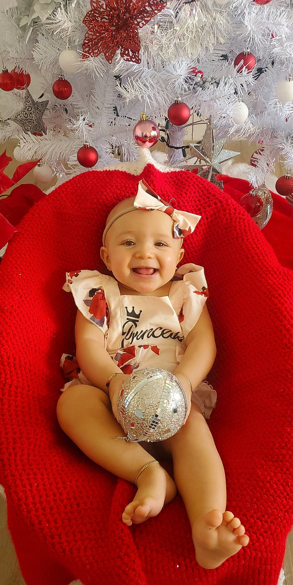 áilana joined the competition — help win amazing prizes! abdomen, baby, baby_toddler_clothing, carmine, child, christmas_ornament, event, face, happy, head, headgear, headwear, holiday, human_body, joy, ornament, person, pink, red, smile
