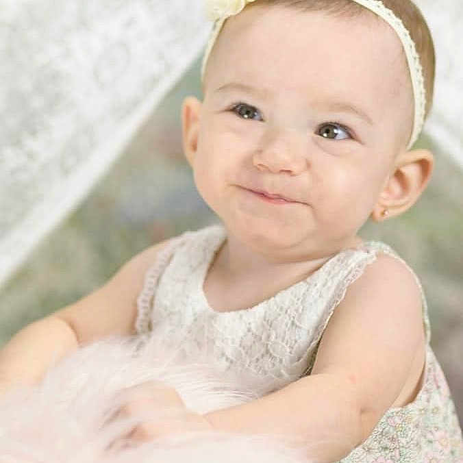 Lilian joined the competition — help win amazing prizes! baby, child, dress, eye, face, hair_accessory, head, headband, headgear, headpiece, iris, people, person, photograph, photography, pink, skin, smile, toddler, white