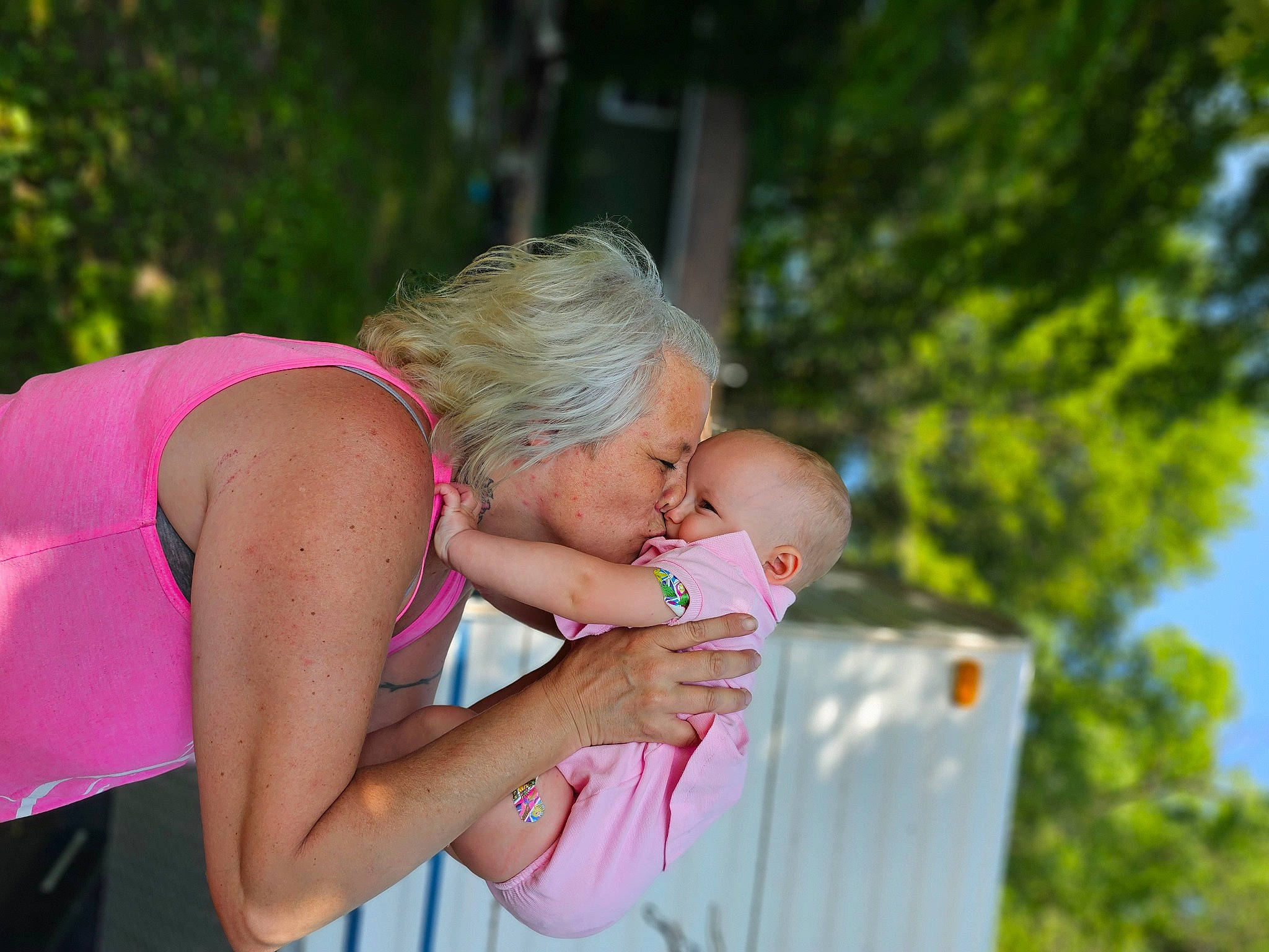 Maeve joined the competition — help win amazing prizes! baby, baby_products, child, event, family, fun, gesture, grass, happy, jewellery, leisure, love, magenta, people_in_nature, person, recreation, sitting, swimming_pool, toddler, tree