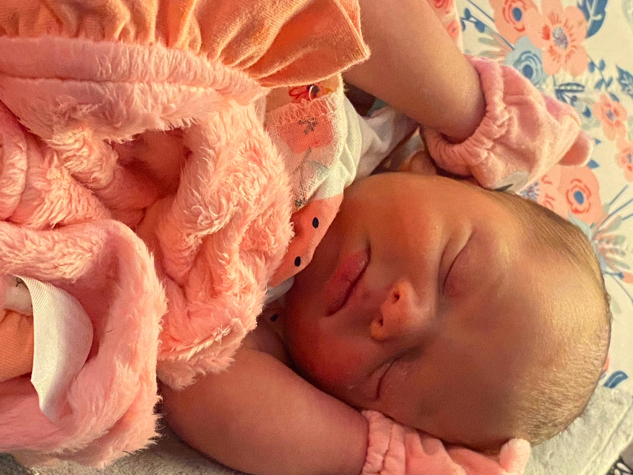 Hensley is registered to the contest to win money with this photo: abdomen, baby, baby_sleeping, baby_toddler_clothing, chest, child, close_up, comfort, finger, headgear, human_body, linens, lip, mouth, neck, peach, person, petal, skin, toddler