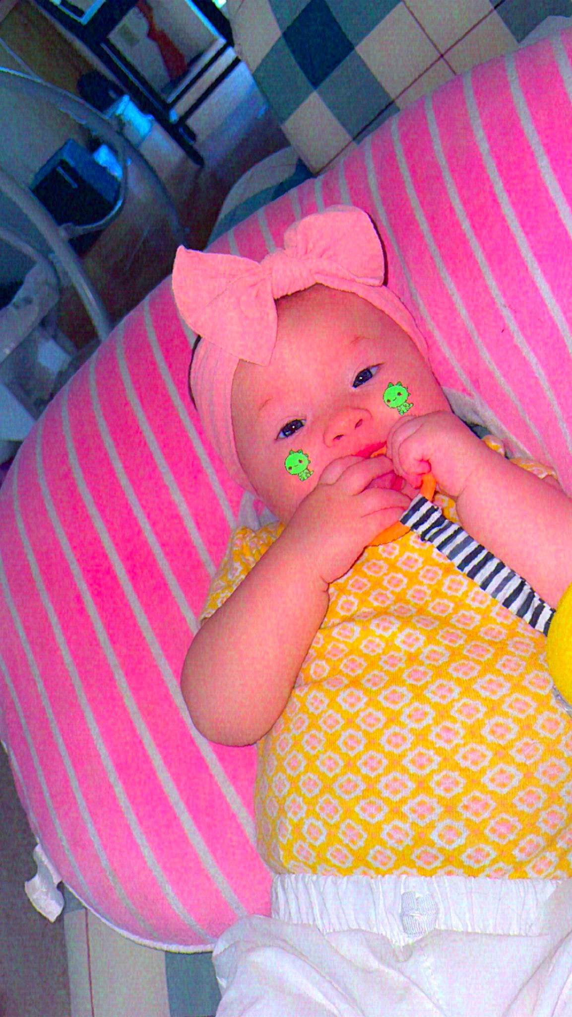 Abigail is registered to the contest to win money with this photo: baby, baby_products, baby_sleeping, baby_toddler_clothing, bedtime, cheek, child, comfort, finger, fun, hand, headwear, human_body, magenta, mouth, nail, pattern, person, pink, skin