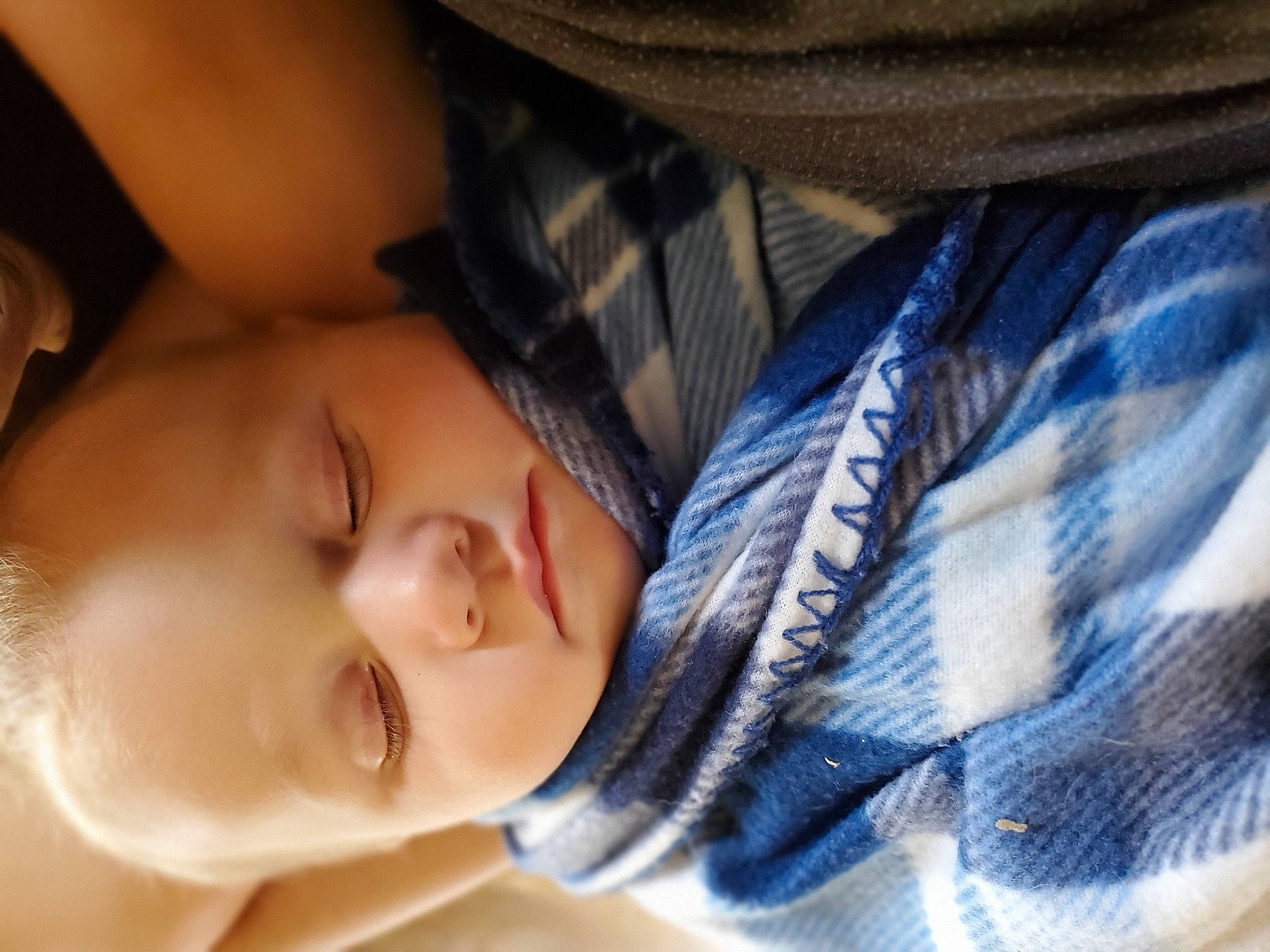 Elijah joined the competition — help win amazing prizes! arm, baby, cheek, chin, comfort, eyebrow, eyelash, hand, happy, head, headgear, iris, lip, mouth, neck, nose, person, plaid, skin, smile