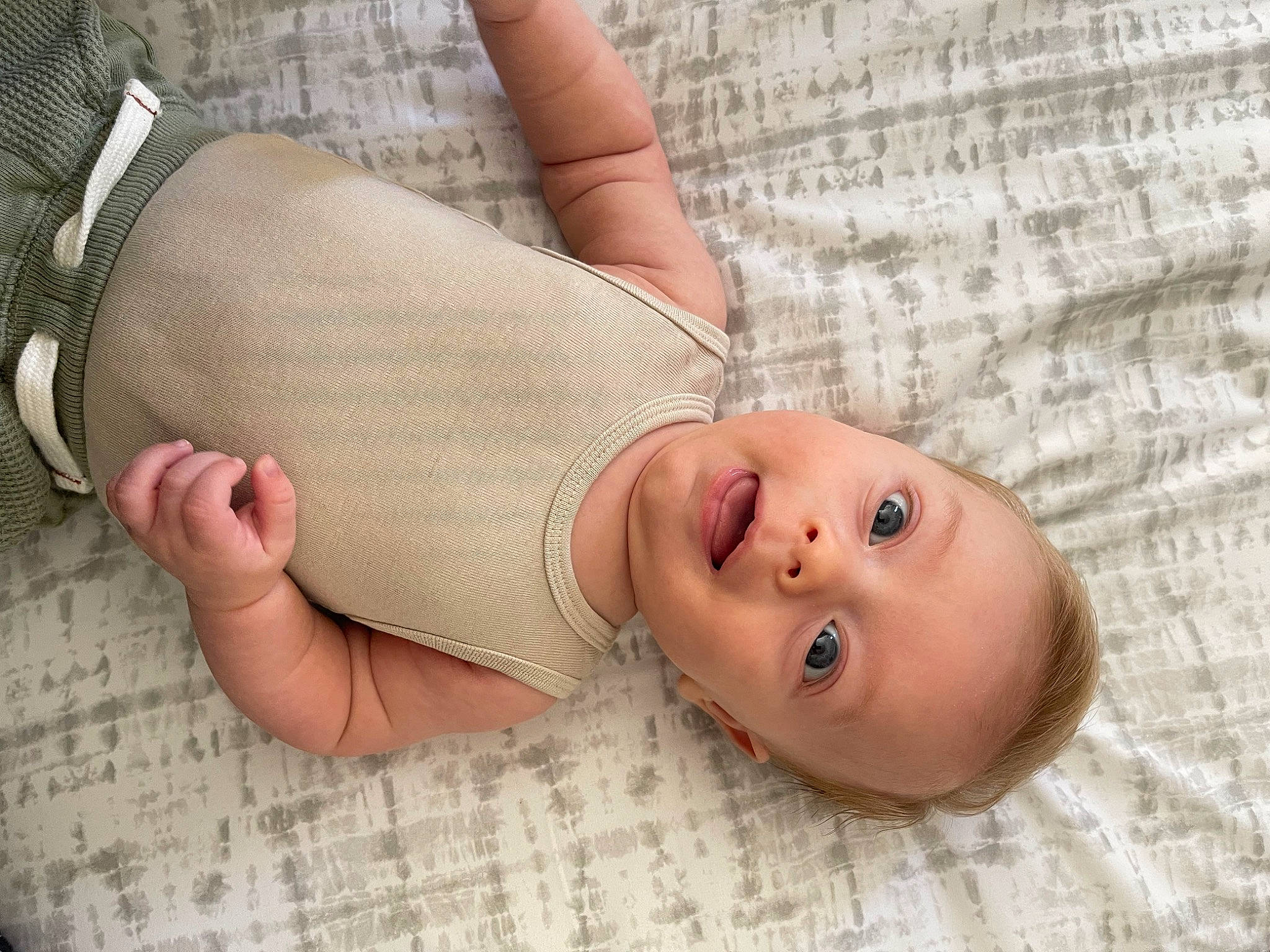 Lux is registered to the contest to win money with this photo: abdomen, baby, baby_toddler_clothing, cheek, chest, child, comfort, finger, gesture, human_body, human_leg, nail, person, skin, sleeve, stomach, thigh, thumb, toddler, wood